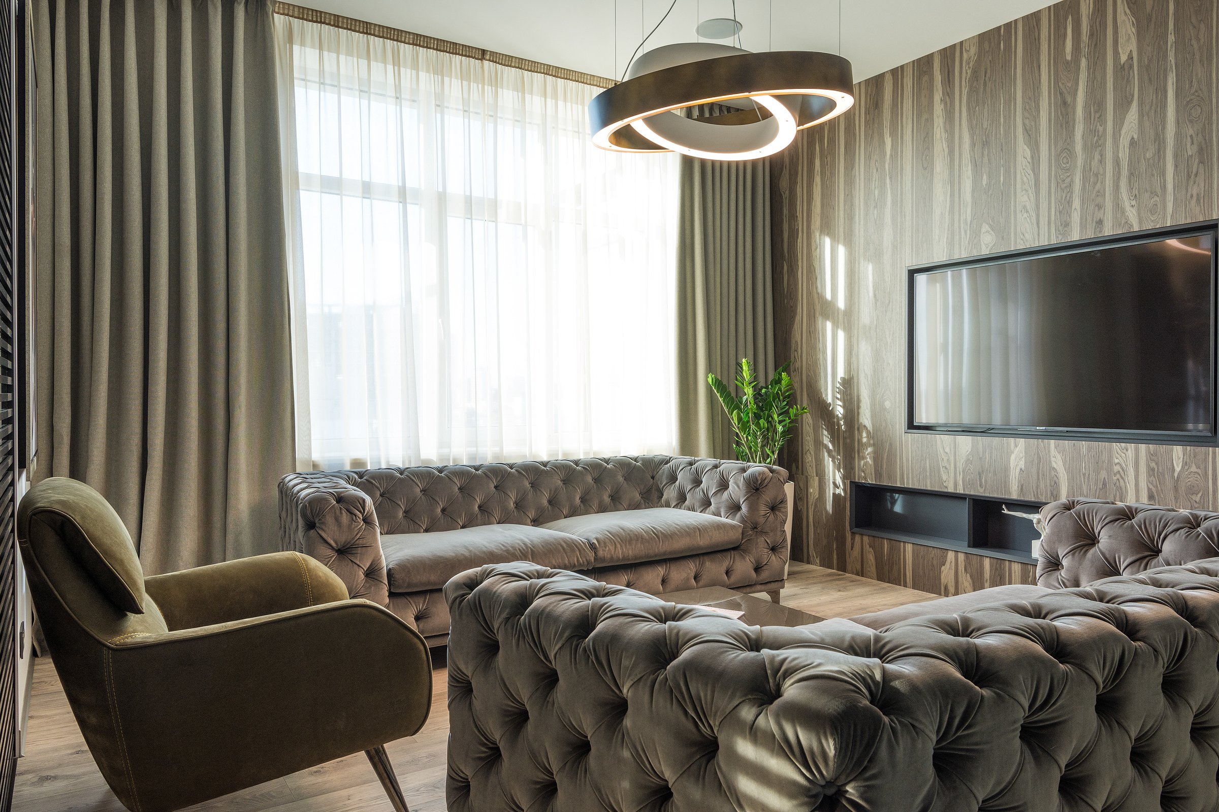 Comfortable living room in modern flat
